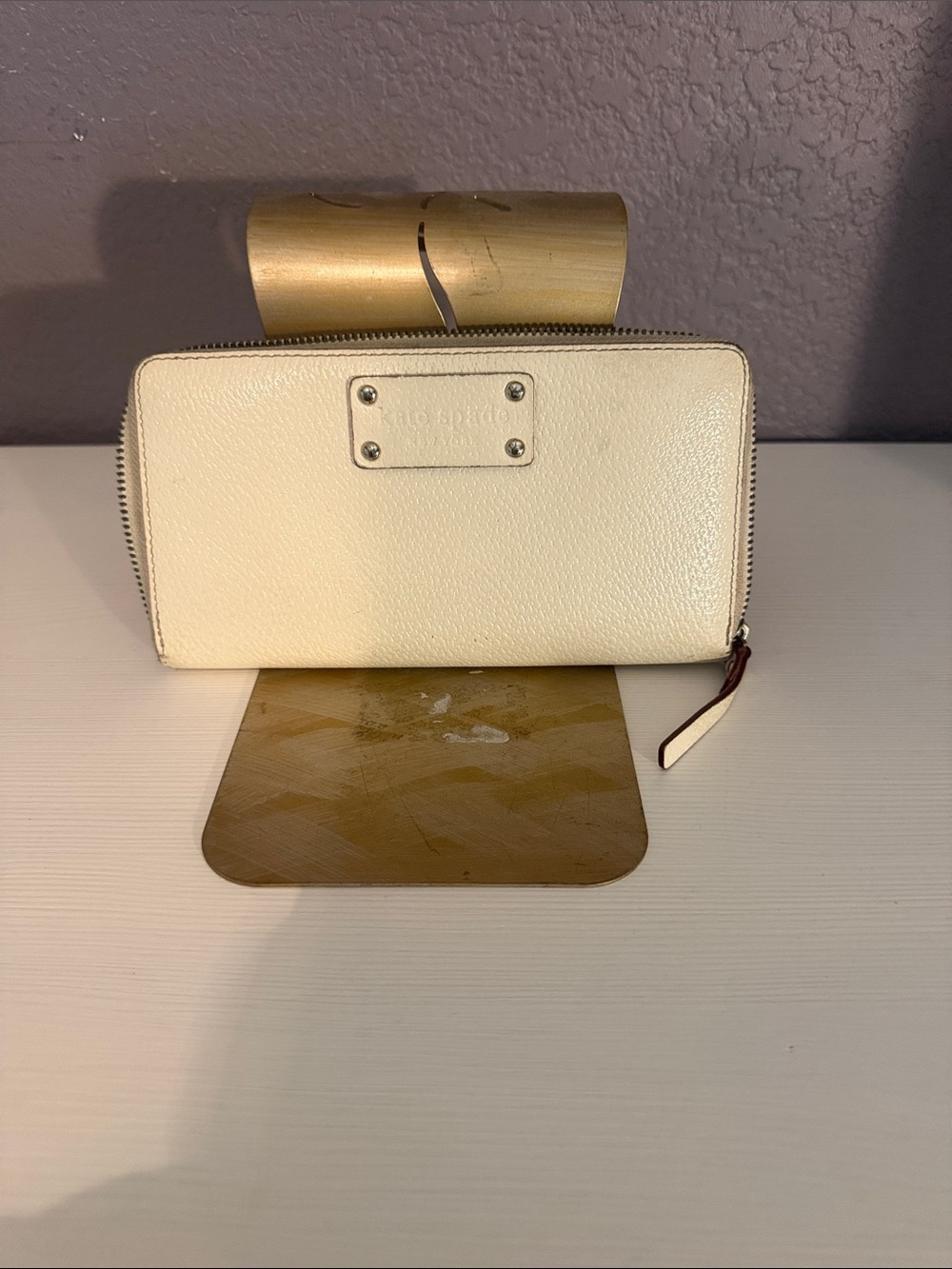 kate spade cream pebbled leather zip wallet